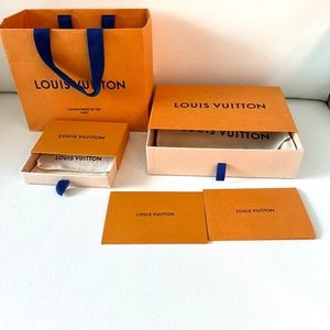 Louis Vuitton shopping bag and boxes